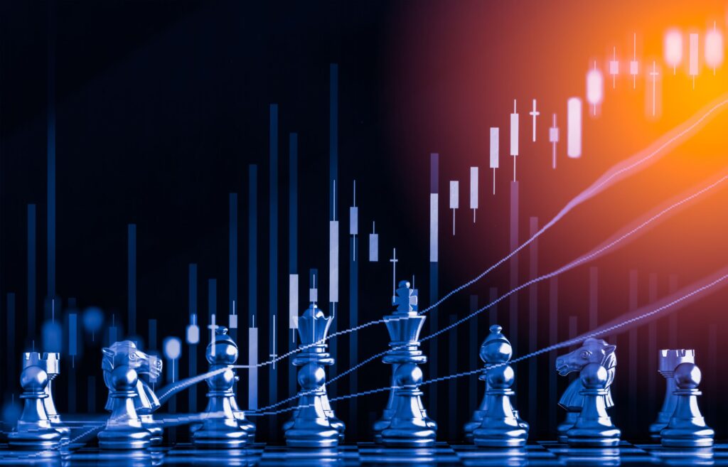 Chess board with digital chart reflecting investment strategy.